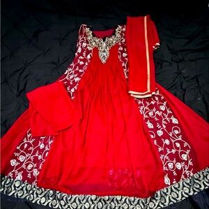 Stunning 3 piece red outfit is a size 34 with 2 and a half inches of margin.